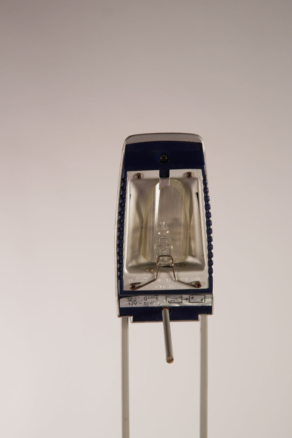 Vintage-style light bulb holder on a plain background